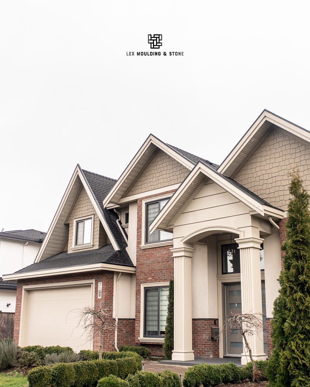 Home with stone and brick detailing